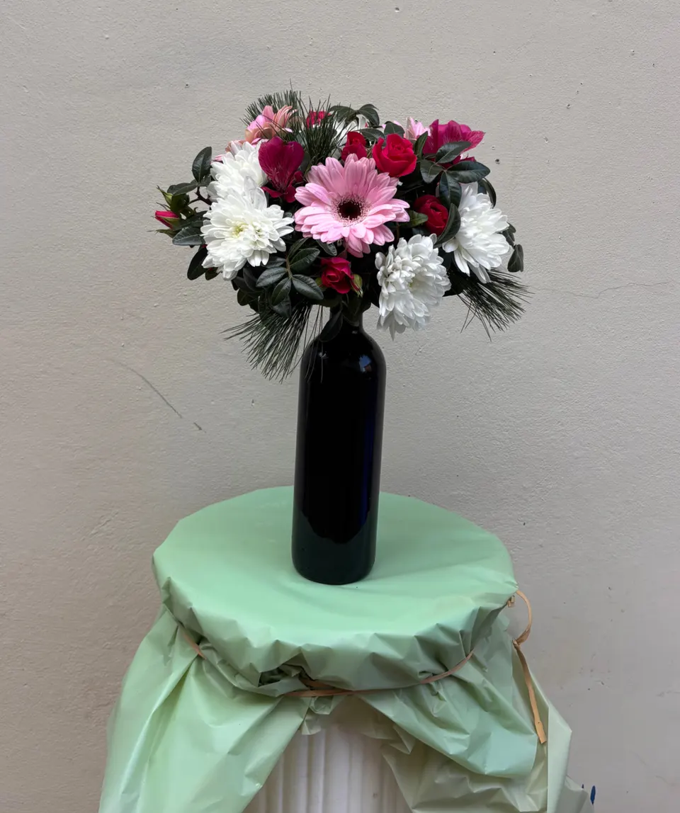 Flower arrangement with wine