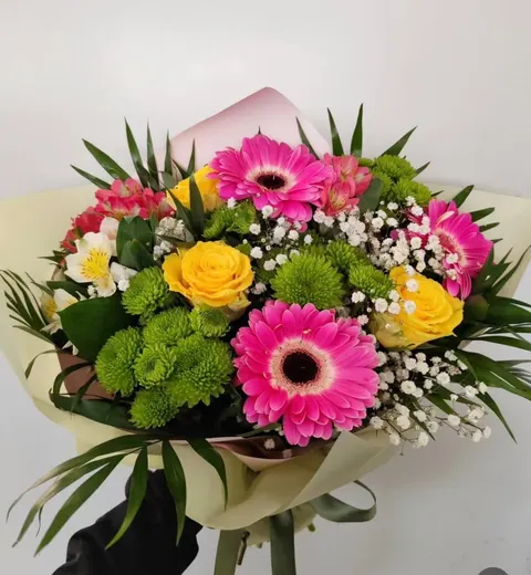 Cyprus Seasonal Flower Bouquet with gerberas, chrysanthemums, roses, alstroemeria, and greenery.