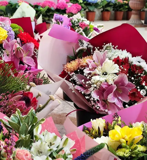 Florist’s choice summer bouquets with fresh seasonal flowers, colorful mixed arrangements for gifts and special occasions