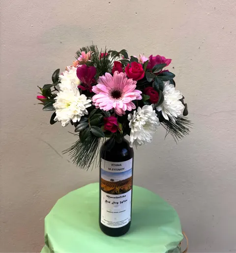 Unique gift with fresh flowers on a wine bottle, available with white, rosé, or red wine and customizable flower colors