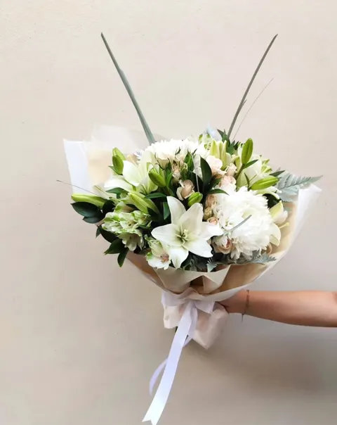 Luxurious Pure Lily bouquet featuring lilies, alstroemeria, mini or spray roses, chrysanthemum anastasia, and fresh greenery,