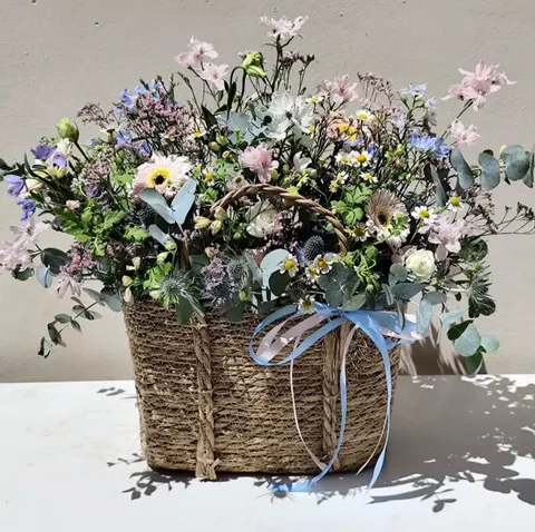 Sweet Summer Flower Basket with colourful seasonal flowers in an elegant basket.